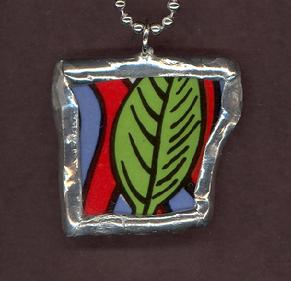 hand soldered bold graphic olive green leaf pendant